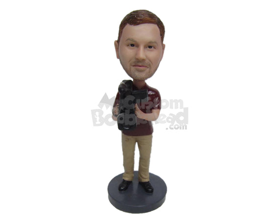 News Reporter Doing Video Work with His Camera Wearing T-Shirt and Pants Personalized Bobblehead News Reporter Doing Video Work with His Camera Wearing T-Shirt and Pants Personalized Bobblehead